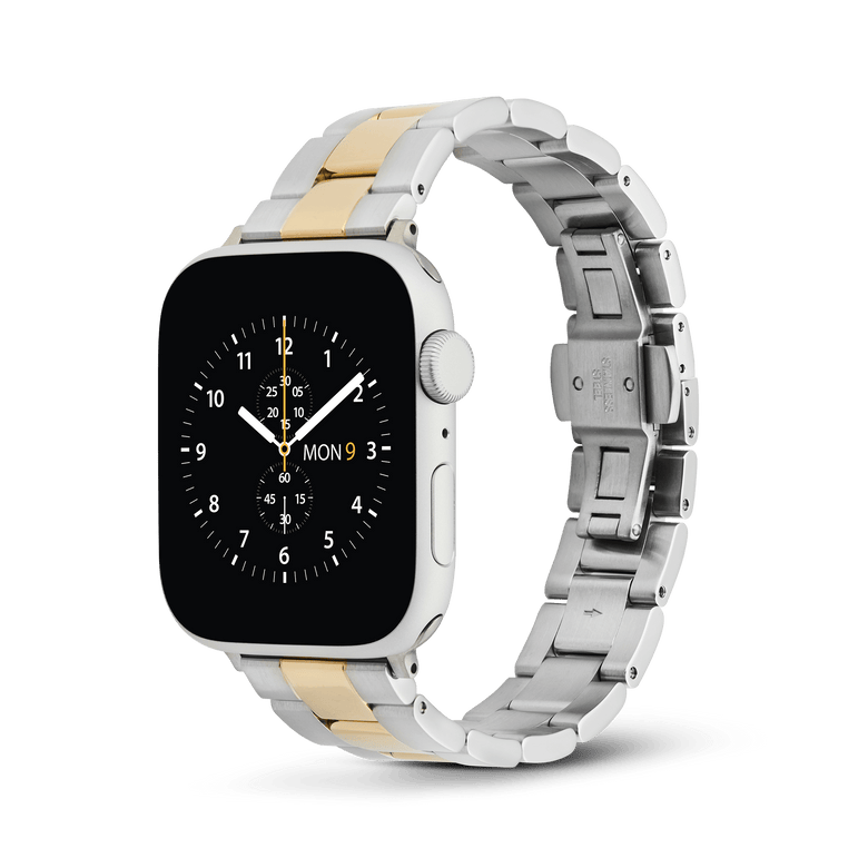 Daniel Wellington's Iconic Link smartwatch strap in two-tone silver and gold, featuring a three-piece link design on an Apple Watch.