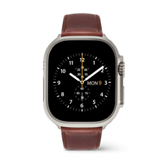 Silver smartwatch with Daniel Wellington's St Mawes brown leather strap and a black chronograph-style digital display.